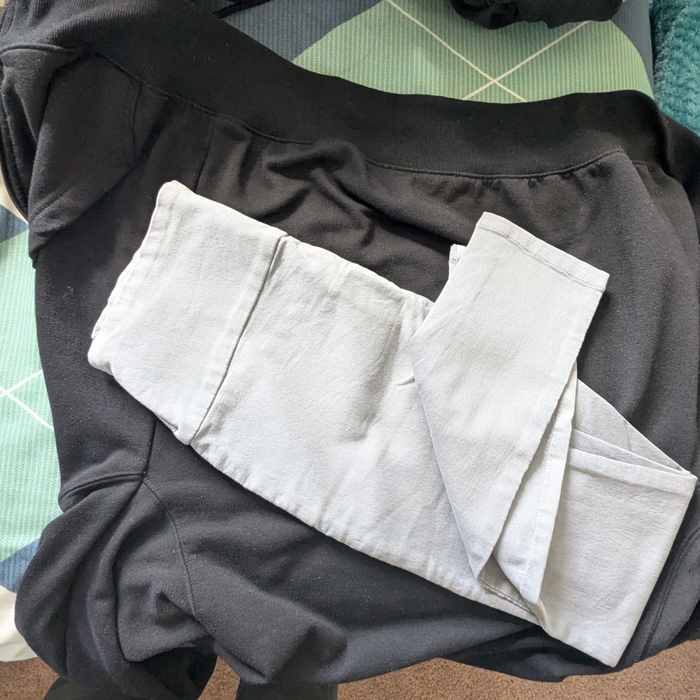 Black Top and Light Gray Pants